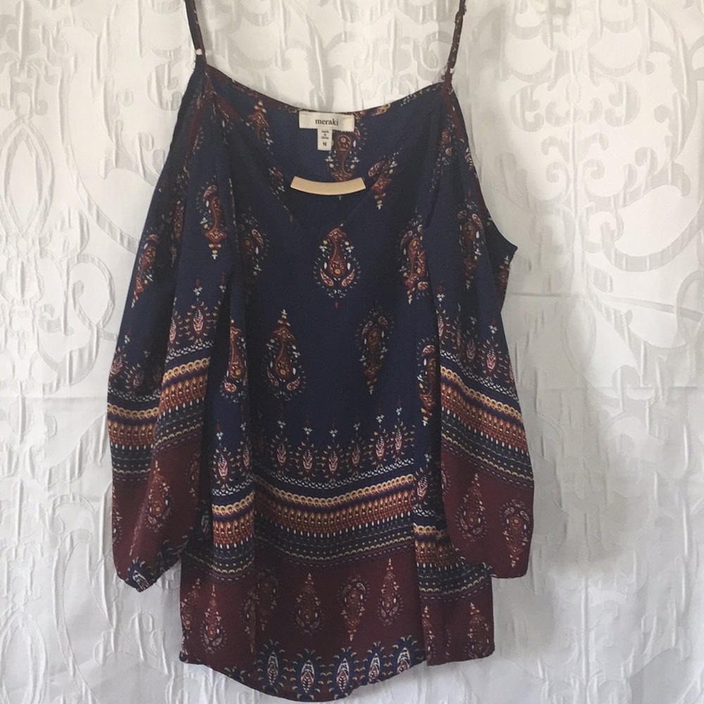 Blouse, hippie looking, loose fitting.